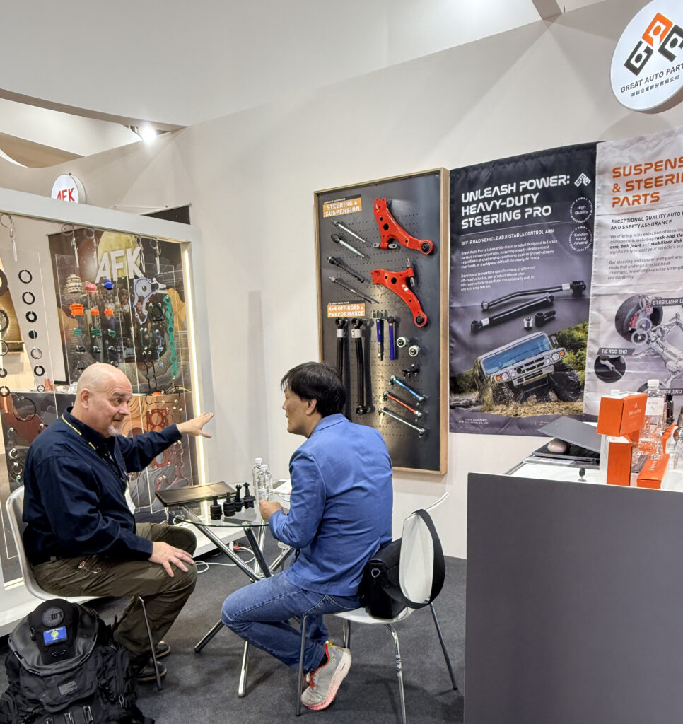 Great Auto Parts team discussing custom chassis solutions with clients